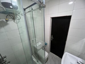 Family Room, Balcony, City View | Bathroom - House 21 (Kaduna)