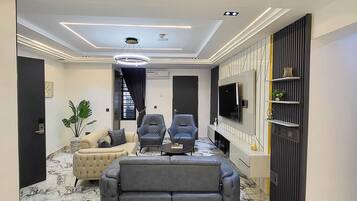 Deluxe Apartment, Balcony, City View | Living area