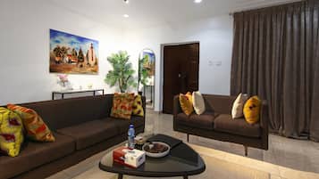 Deluxe appartement, balkon, uitzicht op stad | Woonruimte