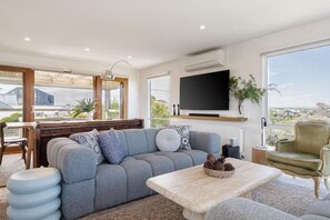 TV, fireplace - Dune View - Quintessential coastal living with a creative soul (Blairgowrie)