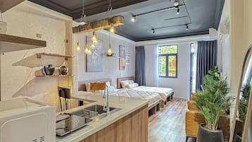 Suite estudio familiar, no fumadores, vistas a la ciudad | Interior