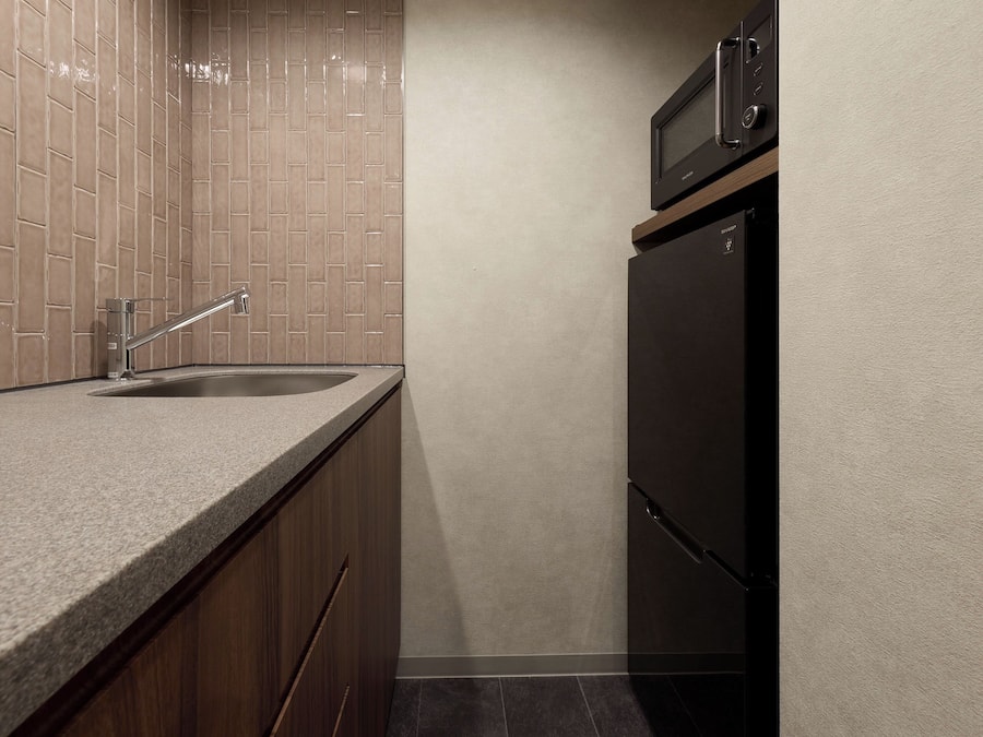 Deluxe Family Room(Triple),Non Smoking | Private kitchen | Fridge, microwave, electric kettle, cookware/dishes/utensils