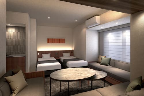 Chambre Deluxe avec lits jumeaux, non-fumeur (Family) | Coffre-fort, accès au Wi-Fi (inclus), literie fournie