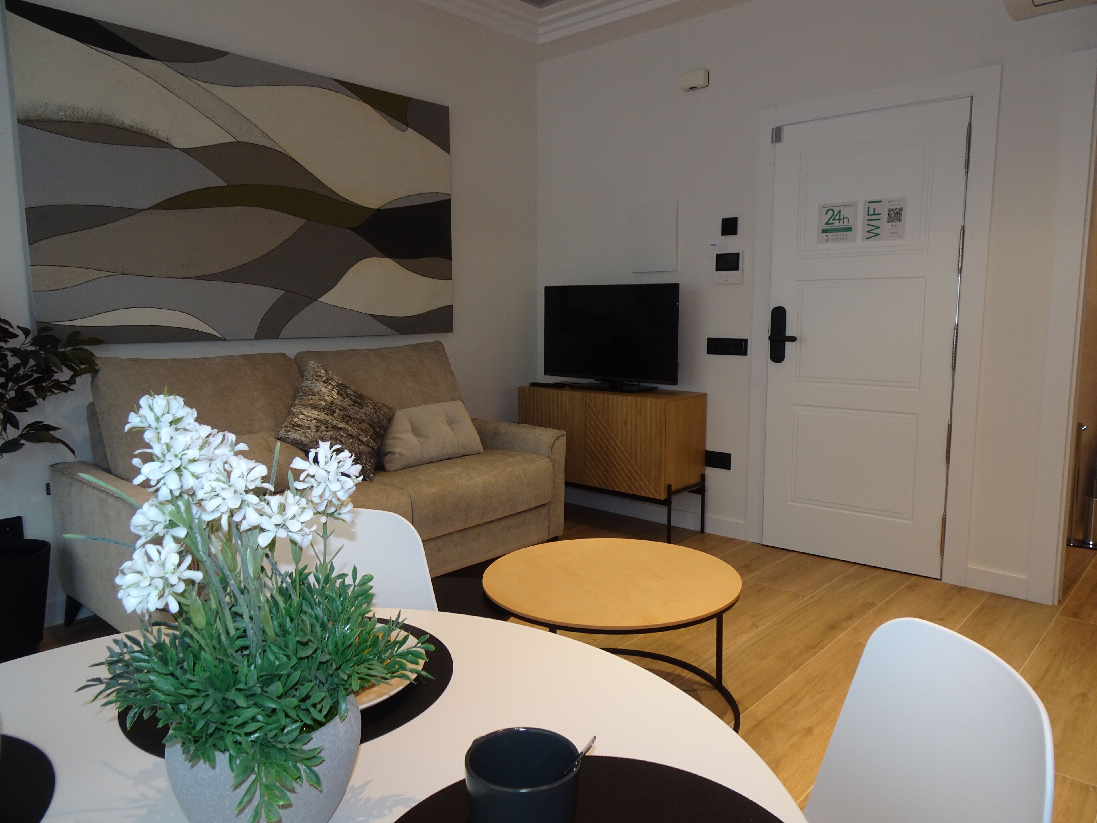 Superior Apartment | Living area | 32-inch Smart TV with digital channels