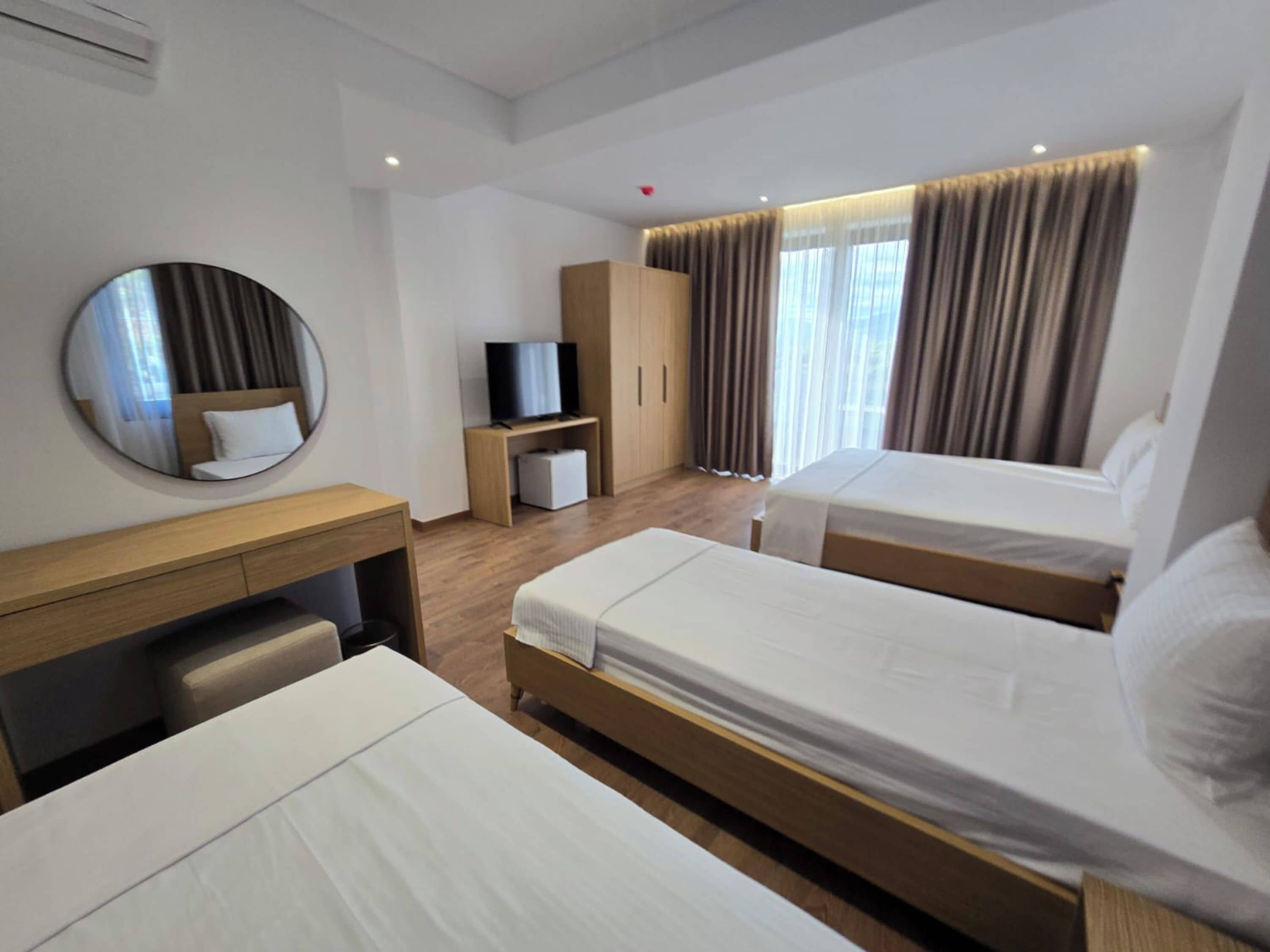 Quarto quádruplo | Wi-Fi de cortesia, roupa de cama