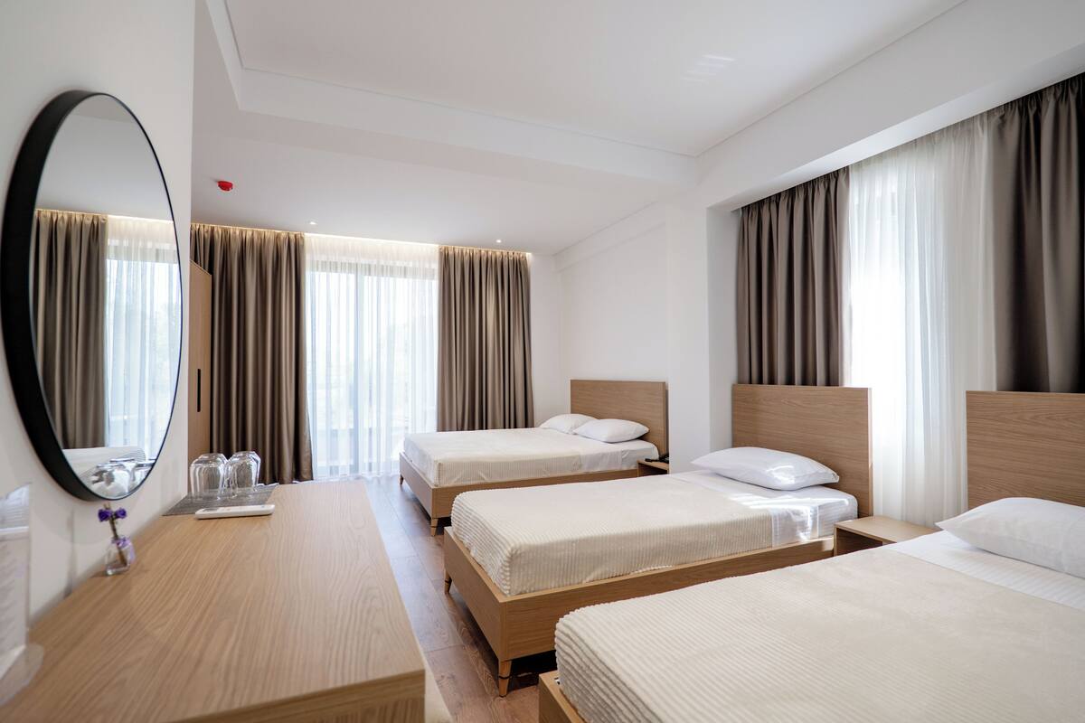 Habitación cuádruple | Wifi gratis y ropa de cama