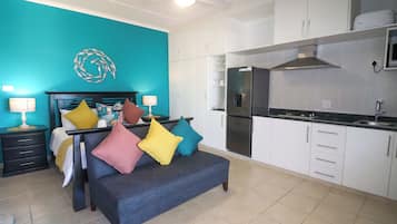 Standard Apartment, Partial Ocean View | Premium bedding, WiFi (free), individually decorated