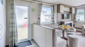 Dining - Gold Caravan with parking 6 (Kidwelly, Carmarthenshire)