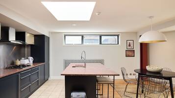 Apartamento, sacada | Cozinha privada