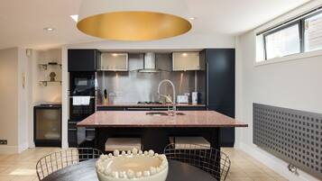 Apartamento, sacada | Cozinha privada