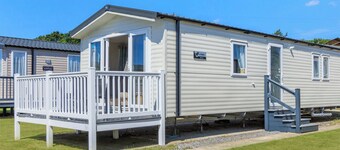 Gold Caravan with parking & decking