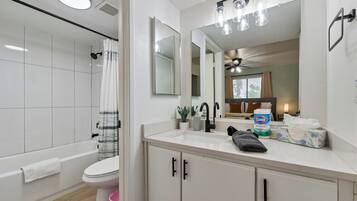 Hair dryer, towels, soap, shampoo