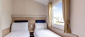 Silver Caravan with decking