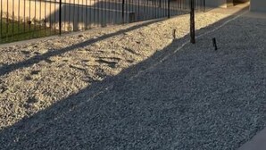 A modern building with a flat roof, multiple windows, and a gravel ground. - Maranello Resort Borgo della Montina (Maranello)