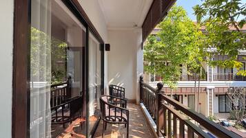Deluxe Twin Room, Balcony, Pool View | Property grounds