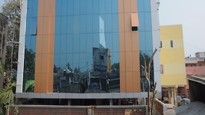 A modern building with a sign reading 'HARIHARAN RESIDENCY.' - HARIHARAN RESIDENCY (Chennai)