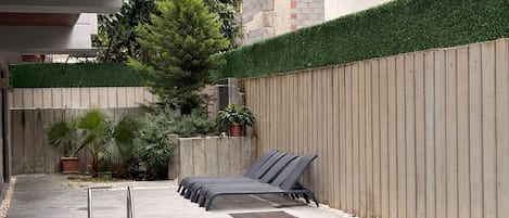 Apartment, Balcony | Pool | Seasonal outdoor pool