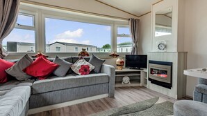 Living area - Gold 3 Caravan slps 8 parking, decking (Thorness, Nr Cowes)
