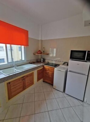 Private kitchen - L'Oranger | Cosy air-conditioned apartment 3 min from the Souk, near Agadir beach (Agadir)