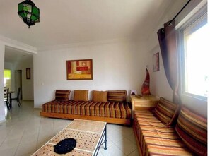 Living area - Charming Le Palmier apartment - Close to the beach, Souk El Had and the town center (Agadir)