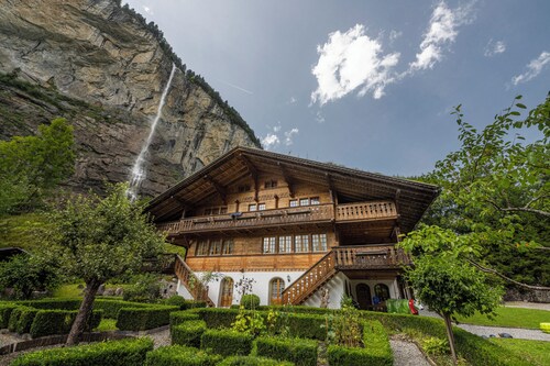 Cozy Apartment in chalet setting with private hot tub and waterfall views