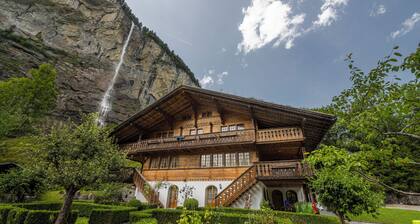 Cozy Apartment in chalet setting with private hot tub and waterfall views