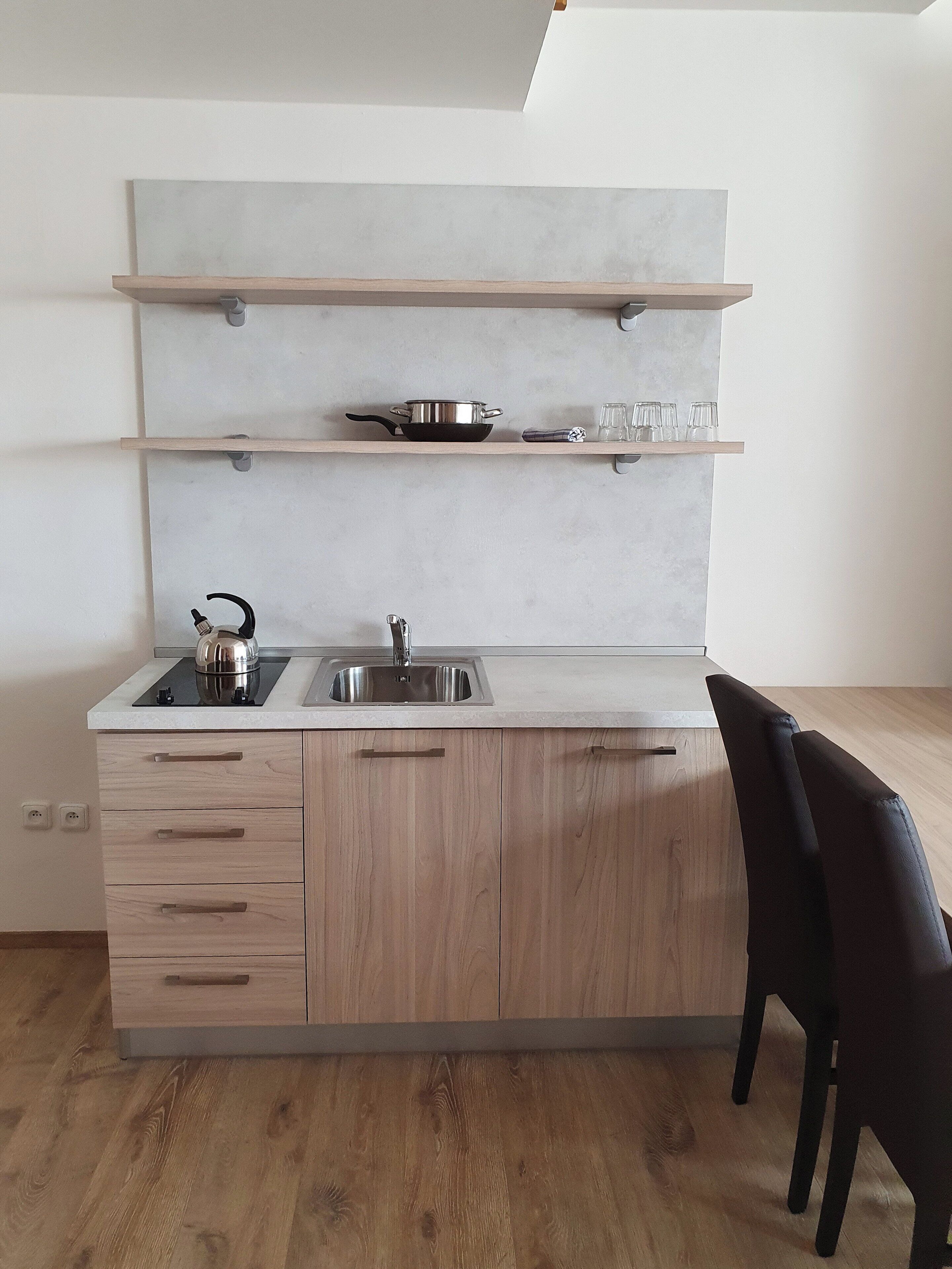Chambre Quadruple Supérieure | Cuisine privée
