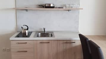 Chambre Quadruple Supérieure | Cuisine privée | Mini réfrigérateur, plaque de cuisson