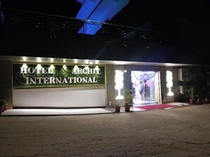 A hotel entrance with a sign reading 'HOTEL ARCHIT INTERNATIONAL.' - HOTEL ARCHIT INTERNATIONAL (Dudhi)