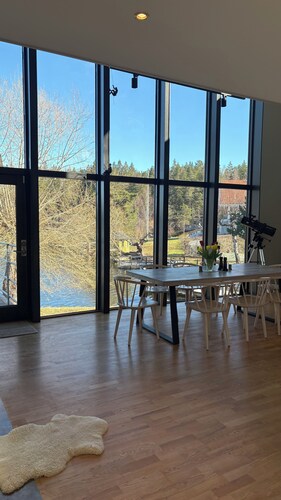 Waterfront villa with private dock & wood-fired sauna in nature reserve