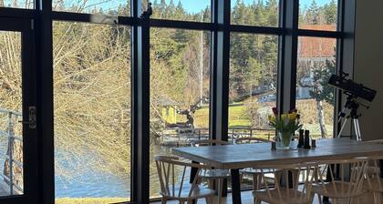 Waterfront villa with private dock & wood-fired sauna in nature reserve