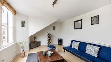 City appartement, 1 tweepersoonsbed met slaapbank, niet-roken, uitzicht op stad | Woonruimte