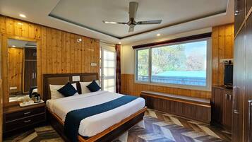 Habitación Deluxe | Sábanas de algodón egipcio, ropa de cama de alta calidad y edredón