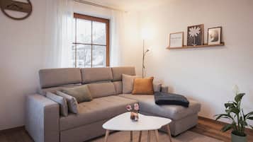 Appartement Familial, vue jardin | Coin séjour