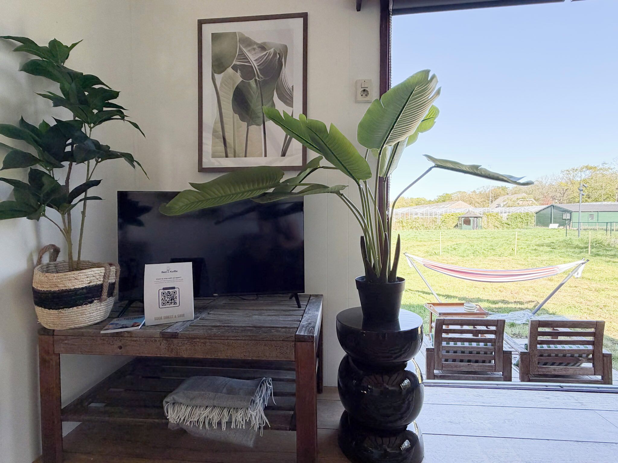 Wake up to greenery in your tiny stay Netherlands with peaceful countryside views.