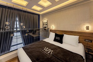 Deluxe-Suite, Gartenblick | Hochwertige Bettwaren, Minibar, Verdunkelungsvorhänge