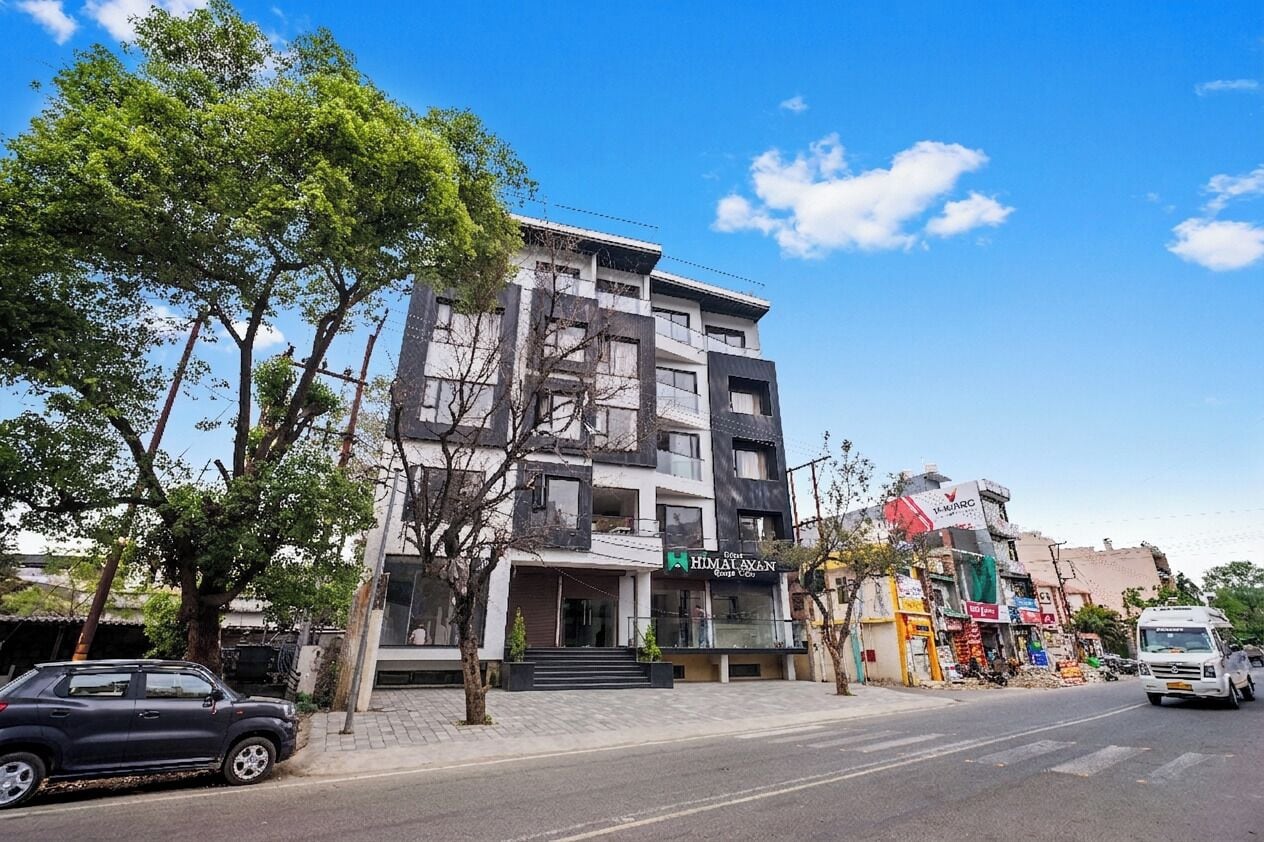 A multi-story building with a storefront labeled 'HIMALAYAN.'