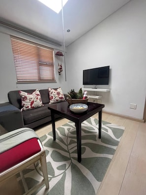 Room, 1 Bedroom, Smoking, Balcony | Living room | Books - Room-sweet Dreams Village Square (Cape Town)