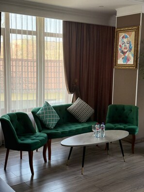 Suíte estúdio superluxo | Área de estar