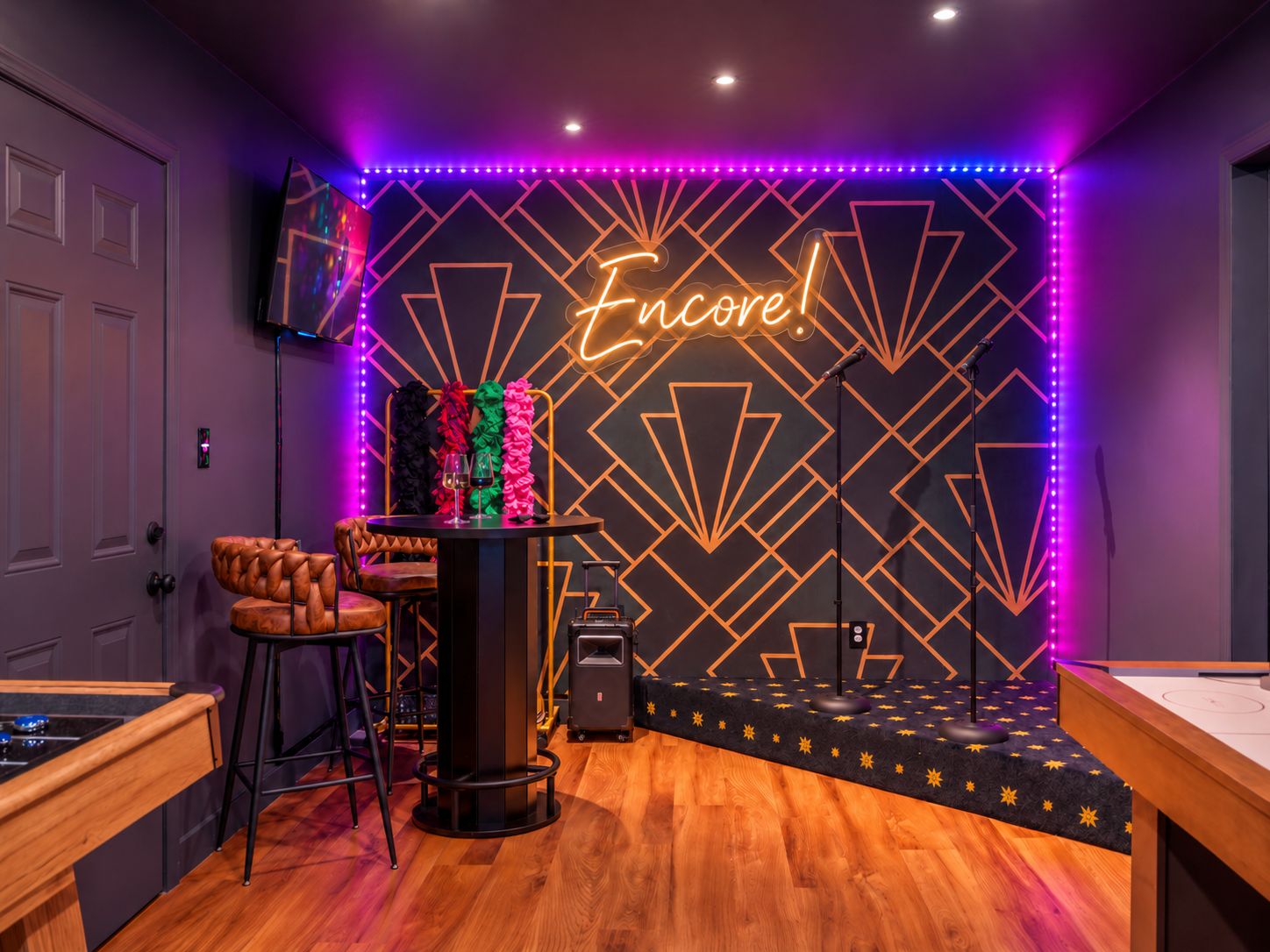A room with a neon sign reading 'Encore!' and a bar area with stools and a table.