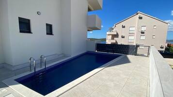 Classic Apartment, Balcony, Beach View | Pool | Seasonal outdoor pool