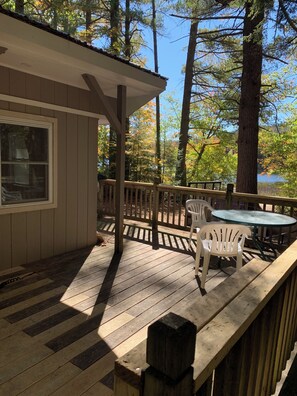 Outdoor dining - Cozy 3-bedroom waterfront cabin with AC in charming Bridgton; dog friendly (Bridgton)