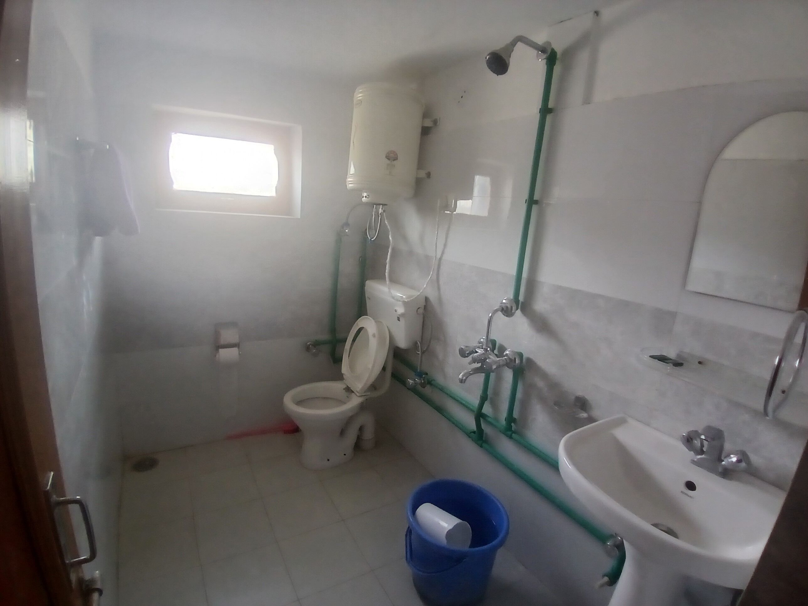 Shower, slippers, towels, soap