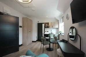 Standard Apartment | Living area | 42-inch Smart TV with satellite channels, Netflix, streaming services - The Sixty 19 Stylish Studios and Apt. (Cardiff)