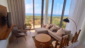 Apartamento superior, balcón, vistas al mar | Zona de estar