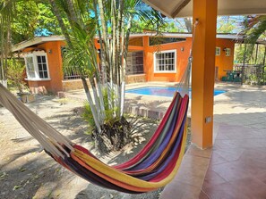 Pool - The ultimate relax for 12 guests. Amazing "bohio" with hammocks, private pool, sports courts, and fire pit. Family rooms with ensuite bathrooms and full kitchen. Just a 10-min walk to the beach. Your tropical oasis in Costa Esmeralda awaits! (San Carlos)