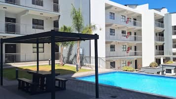 Apartment, 1 Bedroom, Patio | Pool | Outdoor pool