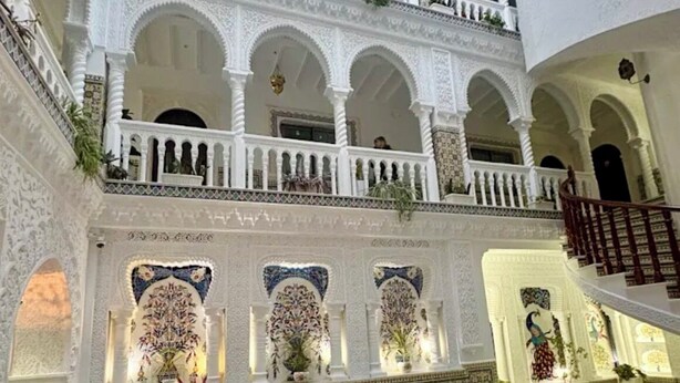 A multi-level atrium with ornate arches, a central fountain, and a marble floor. - Dar Lala Fatma (Algiers)