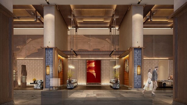 A spacious lobby with high ceilings, large columns, and a central red accent wall. - Hualuxe Guiyang Financial City (Guiyang)