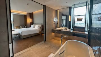 Free minibar items, in-room safe, blackout curtains, iron/ironing board